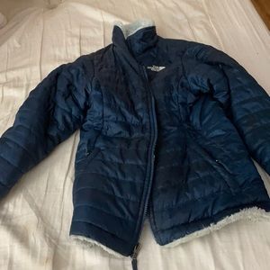 A north face jacket with fur inside